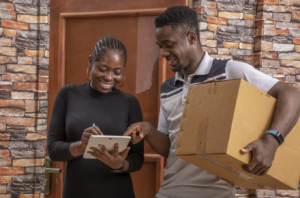 ePOD being signed on a tablet during a courier handover, supporting better delivery workflow management and fewer paper-based POD delays.