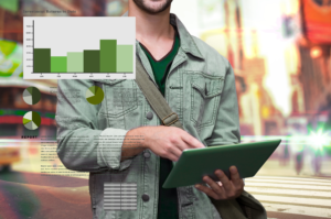 Logistics professional using a tablet with delivery performance analytics and reporting dashboards, supporting an article on logistics analytics.